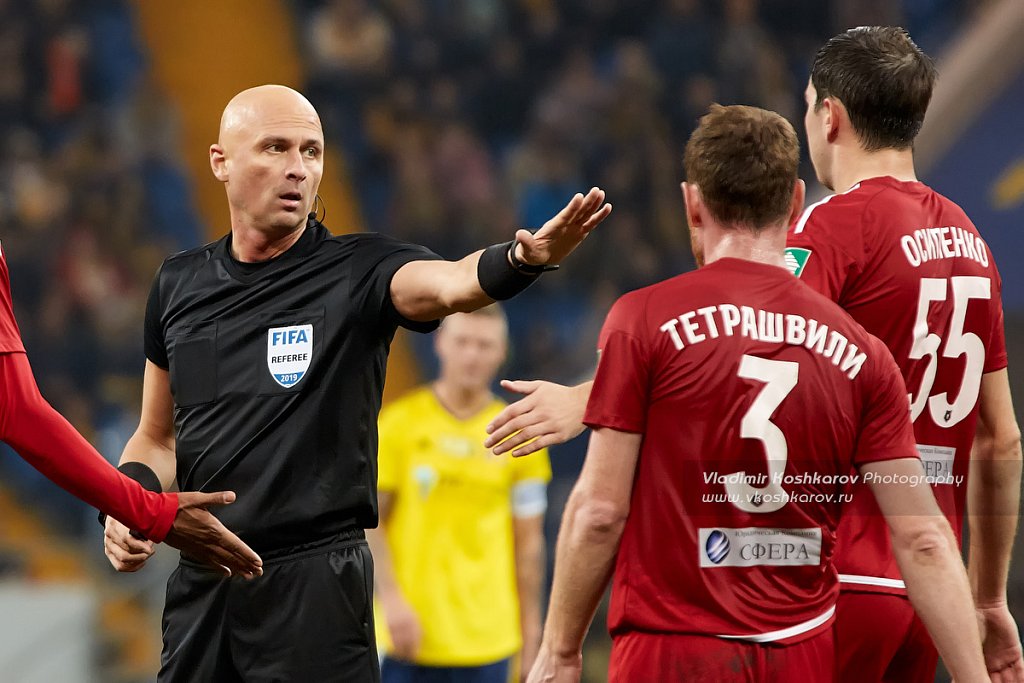 Referee Sergey Karasev reacts